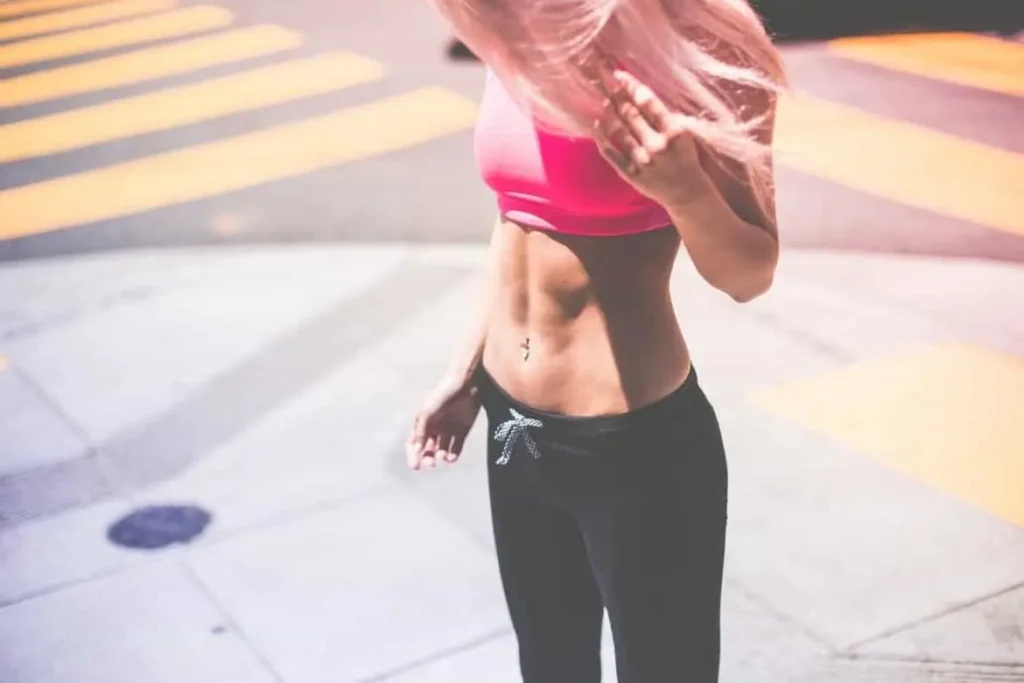 Woman with toned stomach after LA-EMS Body Sculpting Treatment Windlesham